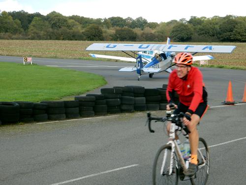 A participant in the  Cobblers Classic rides at speed as he nears the finish in Turweston Aerodrome.