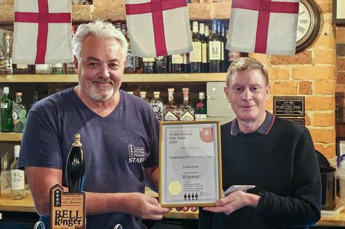Richard Burgham, Vice Chair of the CAMRA Northamptonshire branch, made the presentation to Brewery director, John Evans, on Friday 19 April 2024