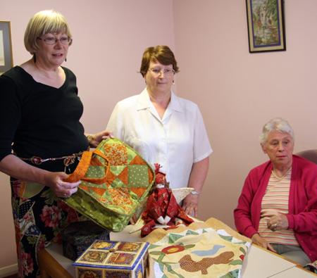 Tove Quilters displaying some of their work