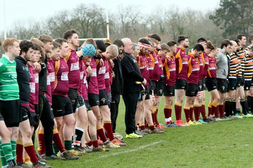 A minute's silence for the late John Woolley was observed before the game
