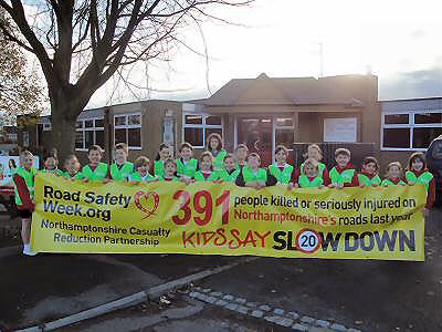 Pupils of Greens Norton Primary School in their Hi Visability Jackets