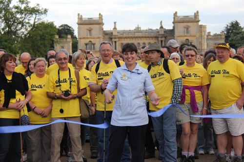 Susan Bradley cutting the ribbon to start the 2012 Grimsthorpe Castle Walk Ten