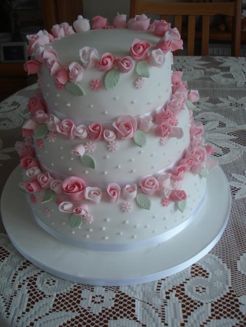 Tiered rose bud celebration cake by Chris Beales