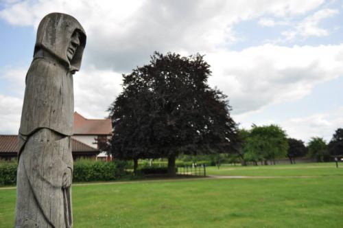 The Ancestor wooden statue in Abbey Gardens