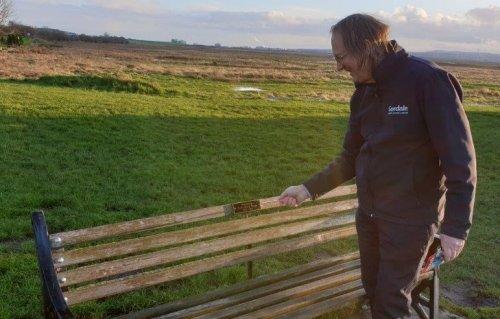 Memorial plaque replaced on bench in Little Neston