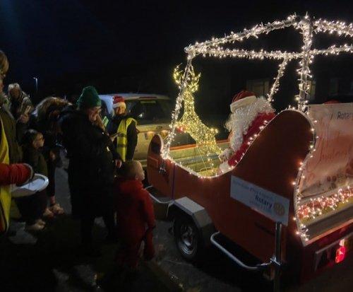 Families enjoyed seeing Santa and his new sleigh.