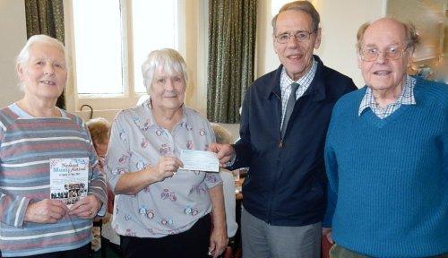 A cheque for Age UK