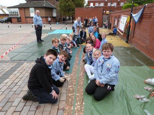 Neston Sea Scouts Raise Hundreds with Thousands of Pennies
