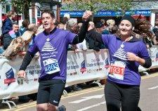 Northern Lights fund raisers Steven Sutherland and Rosemarie Hawkins crossing the line in triumph.