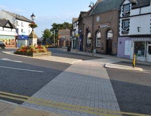 Improvements were made this year to the roads and pavements around The Cross in Neston